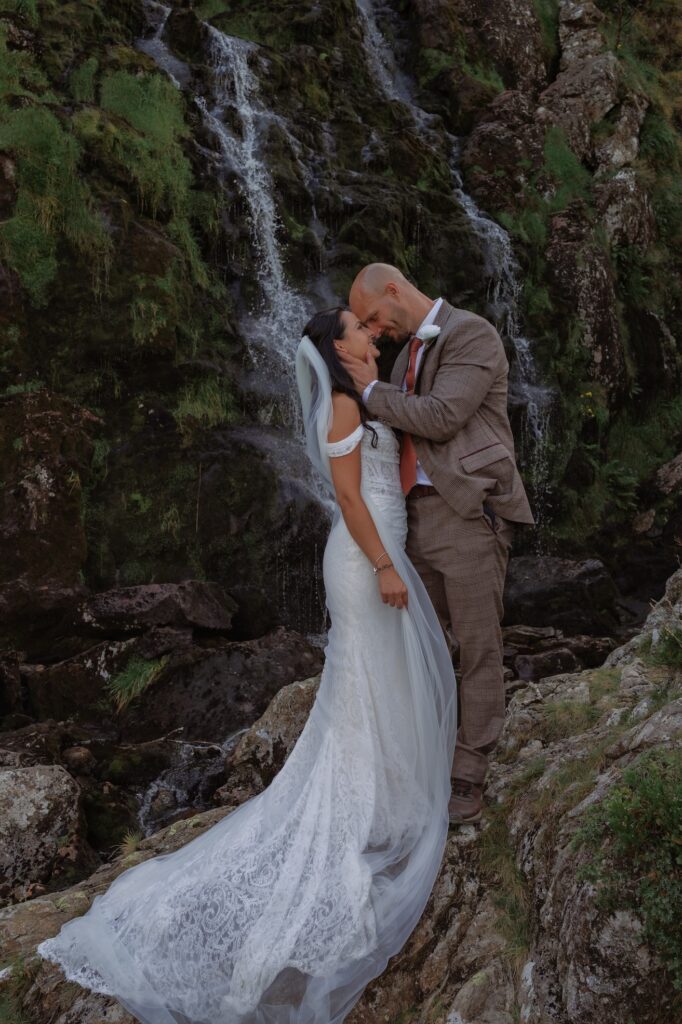 Lake District Elopement couple by a waterfall